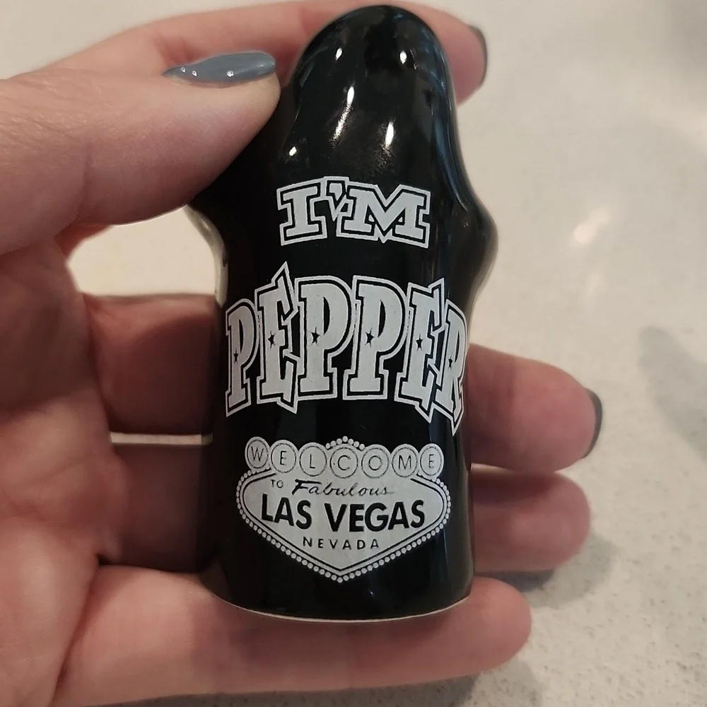Black and white ghost Las Vegas salt and pepper shakers, new without tags!